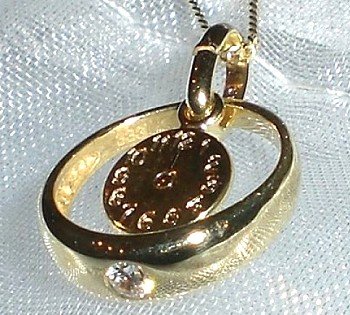 Taufring mit Taufuhr in Gold Taufring mit Taufuhr in Gold